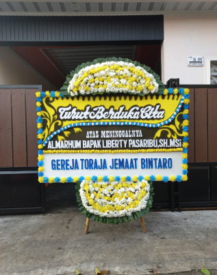 Papan Bunga Duka di Aweku